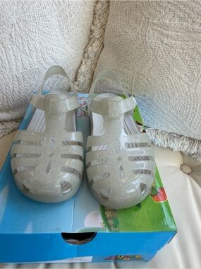 CROCS Kids Glitter Jelly Sandals in Pearl